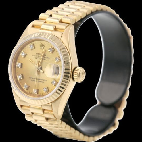 Montre Rolex Datejust - Montre Lady 26 mm en or jaune avec diamants 58 Facettes MT42418