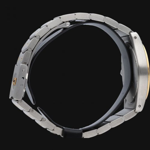 Montre Cartier Santos Ronde - Montre quartz en or jaune et acier 58 Facettes MT42873