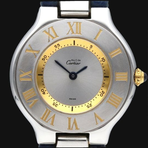 Montre Cartier Must 21 - Montre femme quartz en or jaune et acier 58 Facettes MT42985