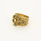 Bague 55 Bague bandeau mouvementée, or jaune, rubis, émeraudes et saphirs 58 Facettes B250458