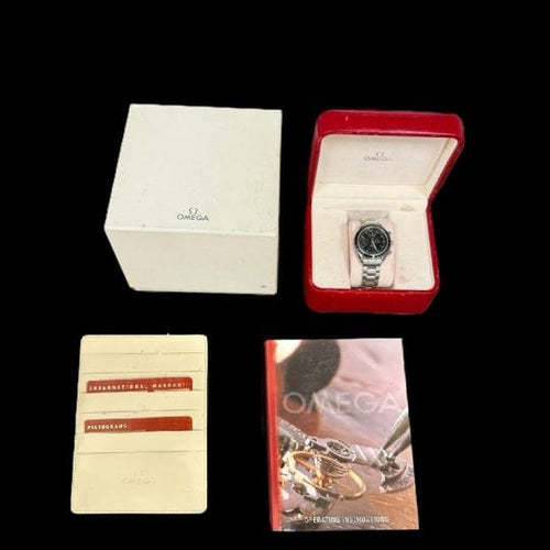 Montre Omega Speedmaster - Montre chronographe Day-Date en acier 58 Facettes MT43711