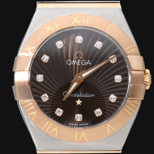 Montre Omega Constellation - Montre femme 27 mm en or jaune et acier 58 Facettes MT43995