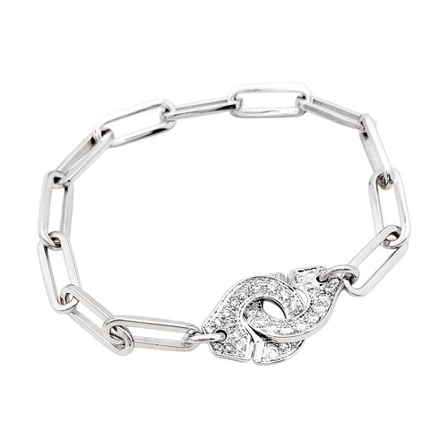 Bracelet Bracelet Dinh Van, "Menottes", or blanc et diamants. 58 Facettes 35224