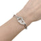 Bracelet Bracelet Dinh Van, "Menottes", or blanc et diamants. 58 Facettes 35224