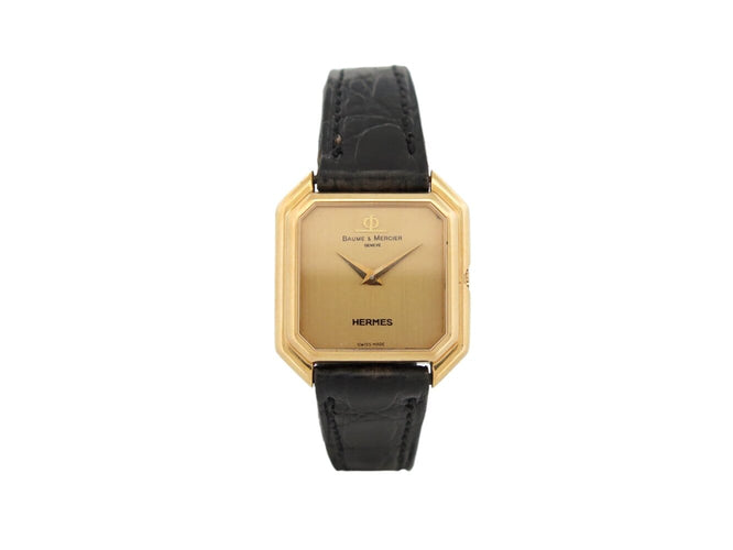 Montre vintage montre baume & mercier pour HERMES ceinture or jaune 18k mecanique 58 Facettes 273007