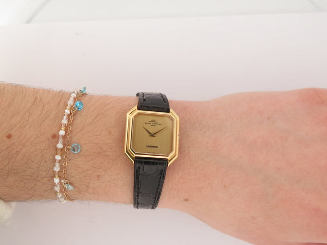 Montre vintage montre baume & mercier pour HERMES ceinture or jaune 18k mecanique 58 Facettes 273007