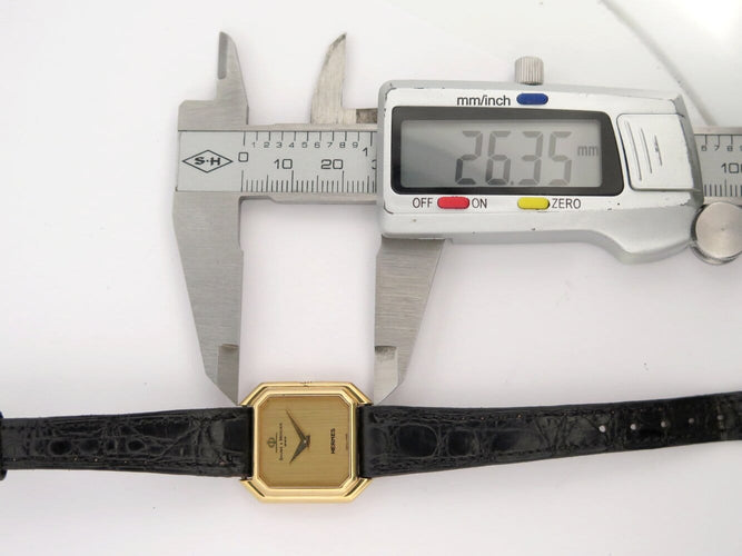 Montre vintage montre baume & mercier pour HERMES ceinture or jaune 18k mecanique 58 Facettes 273007