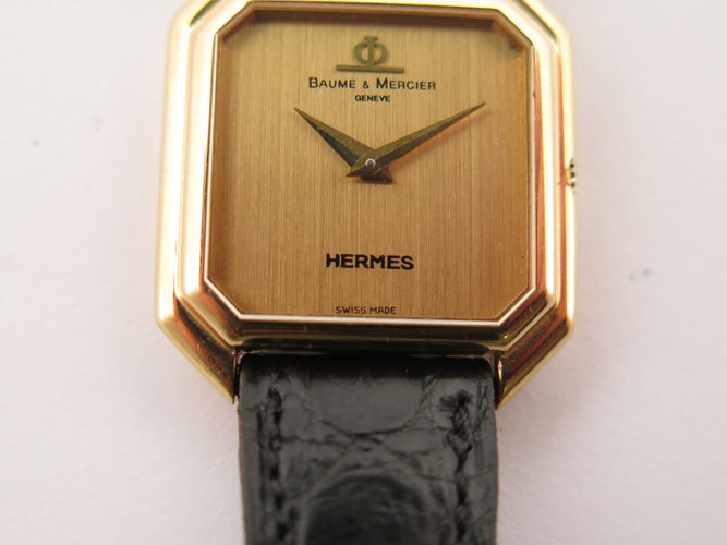 Montre vintage montre baume & mercier pour HERMES ceinture or jaune 18k mecanique 58 Facettes 273007
