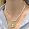 Collier Collier or jaune, perles de culture, camée onyx. 58 Facettes 34595