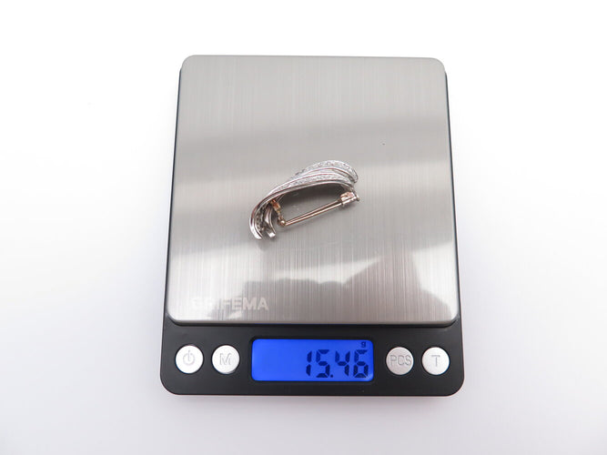 Broche broche 1960 sertie diamants baguette & ronds 9ct platine 15.4gr 58 Facettes 273027