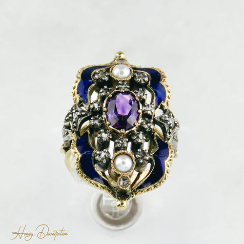 Bague 54 Bague Art nouveau émaillée en or 18K et or blanc, diamants et améthyste 58 Facettes 1725