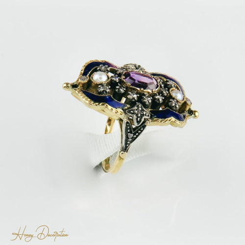 Bague 54 Bague Art nouveau émaillée en or 18K et or blanc, diamants et améthyste 58 Facettes 1725