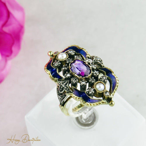 Bague 54 Bague Art nouveau émaillée en or 18K et or blanc, diamants et améthyste 58 Facettes 1725