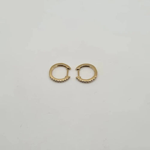 Boucles d'oreilles Créoles or jaune 18 carats serties de diamants 58 Facettes