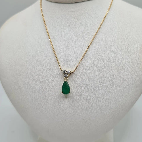 Collier Collier or jaune 18 carats sertie d’une émeraude et diamants naturels 58 Facettes