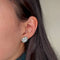 Boucles d'oreilles Boucles d'oreilles Flocons - Or blanc, Emeraudes et Diamants 58 Facettes 250356R