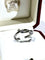 Bague 56 Cartier Entrelacés - Bague en or blanc 750 58 Facettes