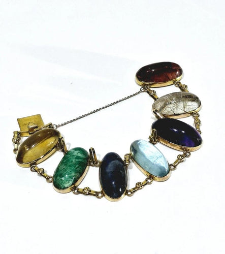 Bracelet Bracelet en or champagne 18 carats à cabochons de pierres fines 58 Facettes