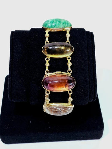 Bracelet Bracelet en or champagne 18 carats à cabochons de pierres fines 58 Facettes