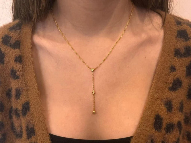 Collier Collier en or jaune 18 carats et diamants 58 Facettes