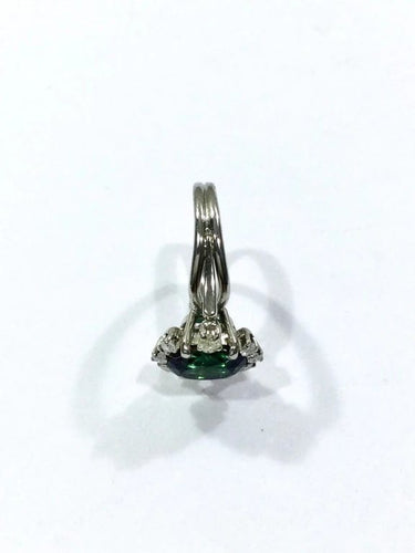 Bague 52 Bague en or blanc 18 carats avec diamants et pierre verte synthétique 58 Facettes