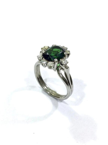 Bague 52 Bague en or blanc 18 carats avec diamants et pierre verte synthétique 58 Facettes