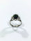 Bague 52 Bague en or blanc 18 carats avec diamants et pierre verte synthétique 58 Facettes
