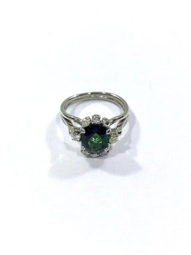 Bague 52 Bague en or blanc 18 carats avec diamants et pierre verte synthétique 58 Facettes