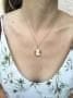 Pendentif Pendentif camée coquillage en or jaune 18 carats 58 Facettes 1146312