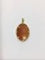 Pendentif Pendentif camée coquillage en or jaune 18 carats 58 Facettes 1146312