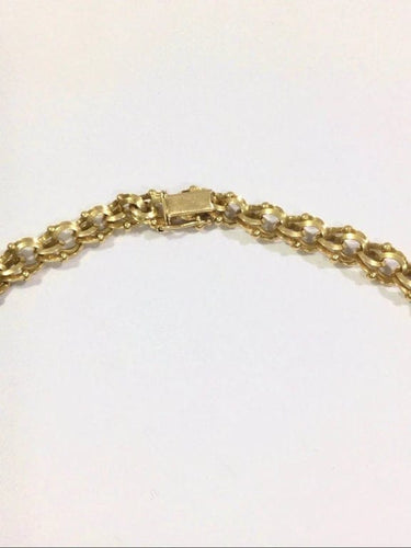 Collier Collier maille entrelacée en or rose 18 carats 58 Facettes 941194