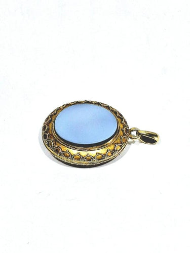 Pendentif Pendentif médaillon photo en or jaune 18 carats et onyx 58 Facettes 940723