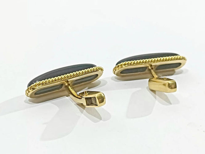 Boutons de manchette Boutons de manchette en or jaune 18 carats et ébène 58 Facettes 3083/4