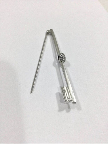 Broche Broche en or blanc 18 carats et diamant taille brillant 58 Facettes