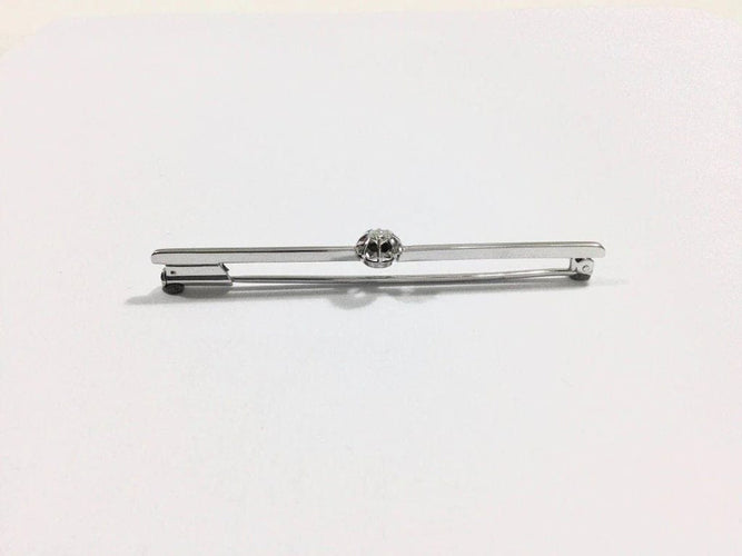 Broche Broche en or blanc 18 carats et diamant taille brillant 58 Facettes