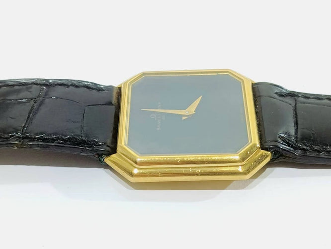 Montre Baume et Mercier - Montre femme en or jaune 18 carats 58 Facettes