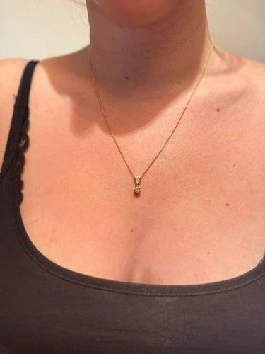 Pendentif Pendentif en or jaune 18 carats et diamants 58 Facettes