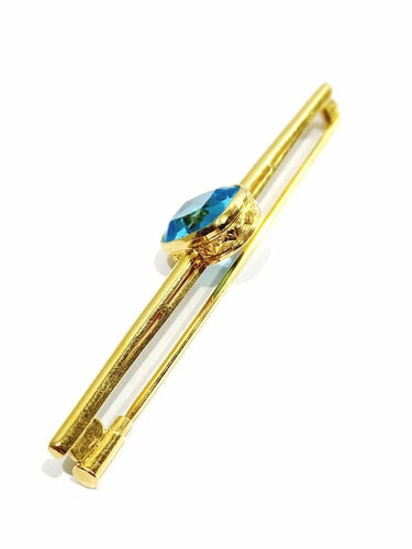 Broche Broche en or jaune 18 carats avec pierre synthétique bleue 58 Facettes