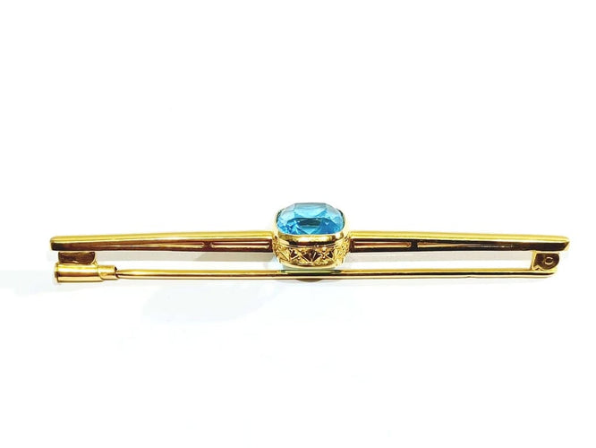 Broche Broche en or jaune 18 carats avec pierre synthétique bleue 58 Facettes