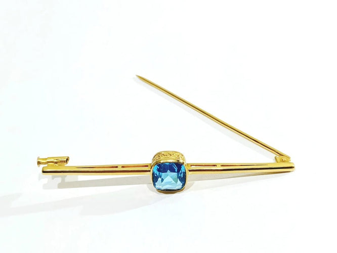 Broche Broche en or jaune 18 carats avec pierre synthétique bleue 58 Facettes