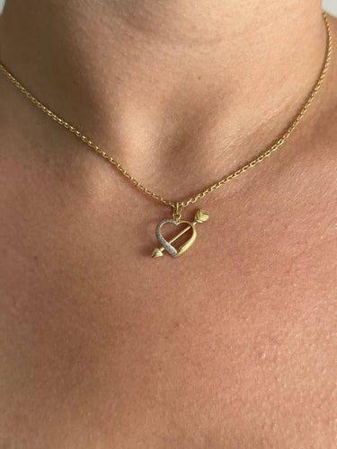 Pendentif Pendentif cœur en or jaune et blanc 18 carats 58 Facettes