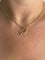 Pendentif Pendentif cœur en or jaune et blanc 18 carats 58 Facettes