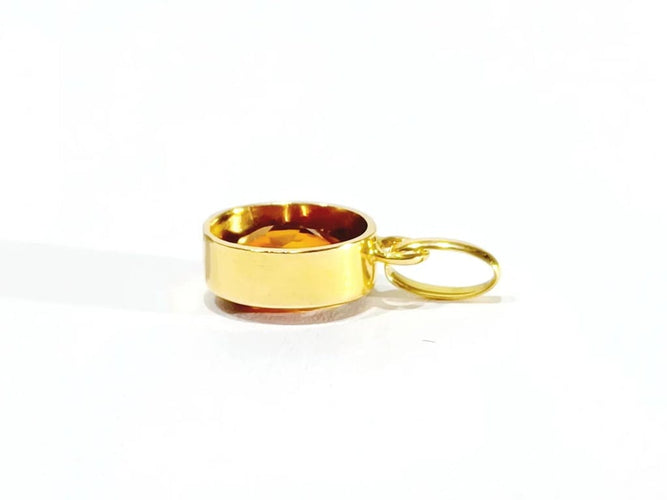 Pendentif Pendentif en or jaune 18 carats et citrine 58 Facettes
