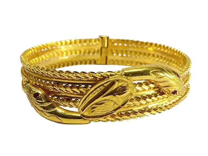 Bracelet Bracelet serpent rigide en or jaune 18 carats et rubis 58 Facettes