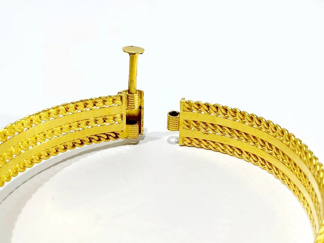 Bracelet Bracelet serpent rigide en or jaune 18 carats et rubis 58 Facettes
