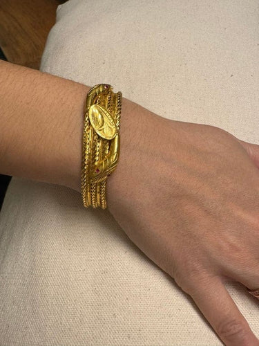Bracelet Bracelet serpent rigide en or jaune 18 carats et rubis 58 Facettes