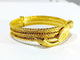 Bracelet Bracelet serpent rigide en or jaune 18 carats et rubis 58 Facettes
