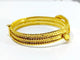 Bracelet Bracelet serpent rigide en or jaune 18 carats et rubis 58 Facettes
