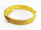 Bracelet Bracelet serpent rigide en or jaune 18 carats et rubis 58 Facettes
