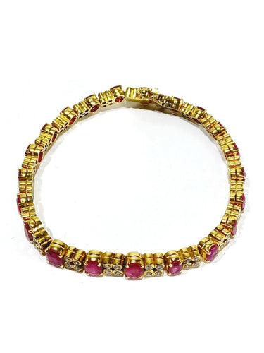 Bracelet Bracelet en or jaune 18 carats avec diamants et rubis 58 Facettes